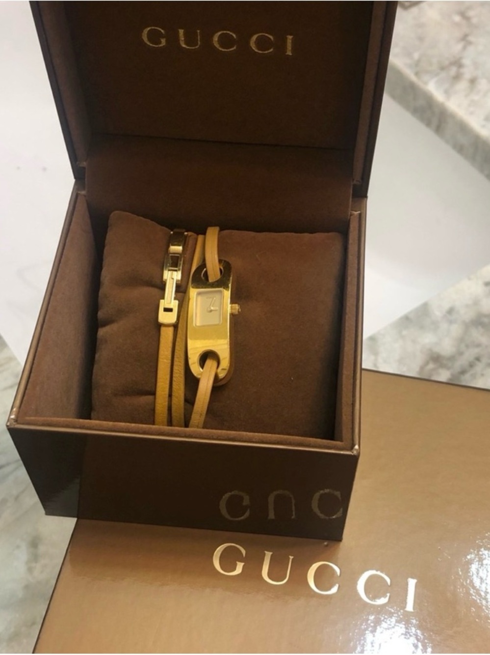 Gucci Gold Tone Watch with Tan Leather Wrap Strap